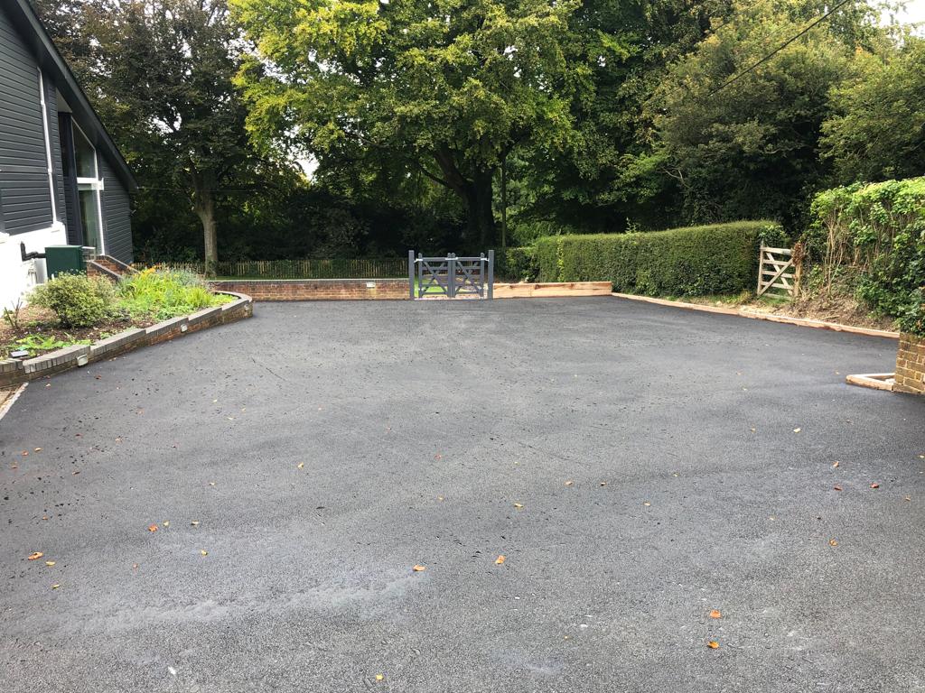 This is a photo of a bitumen driveway which is in the process of being installed by ESK Asphalt & Bitumen Surfacing