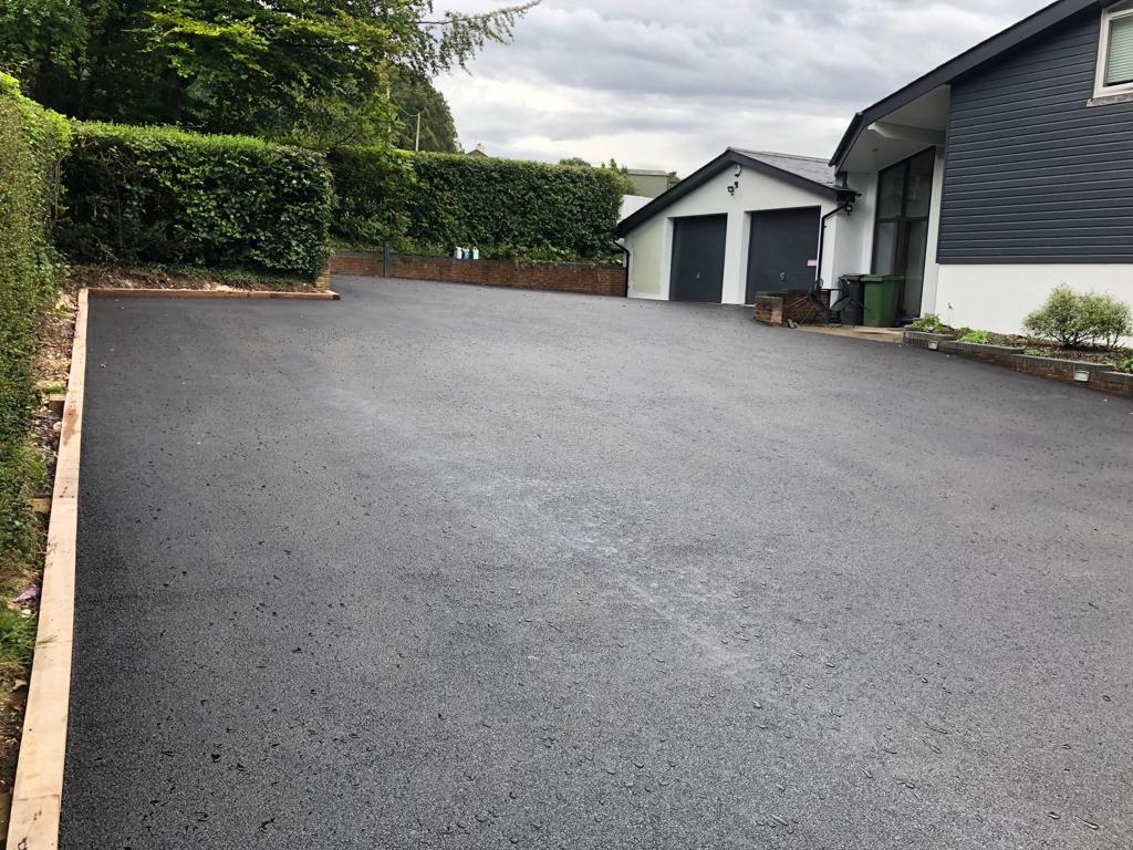 This is a photo of a asphalt driveway which is in the process of being installed by ESK Asphalt & Bitumen Surfacing